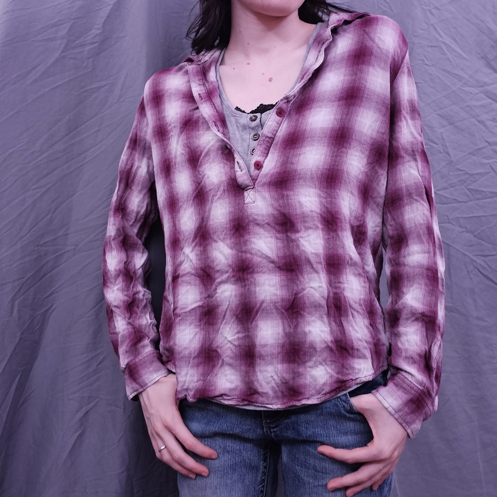 Small maroon half button down plaid shirt with gray undershirt tanktop